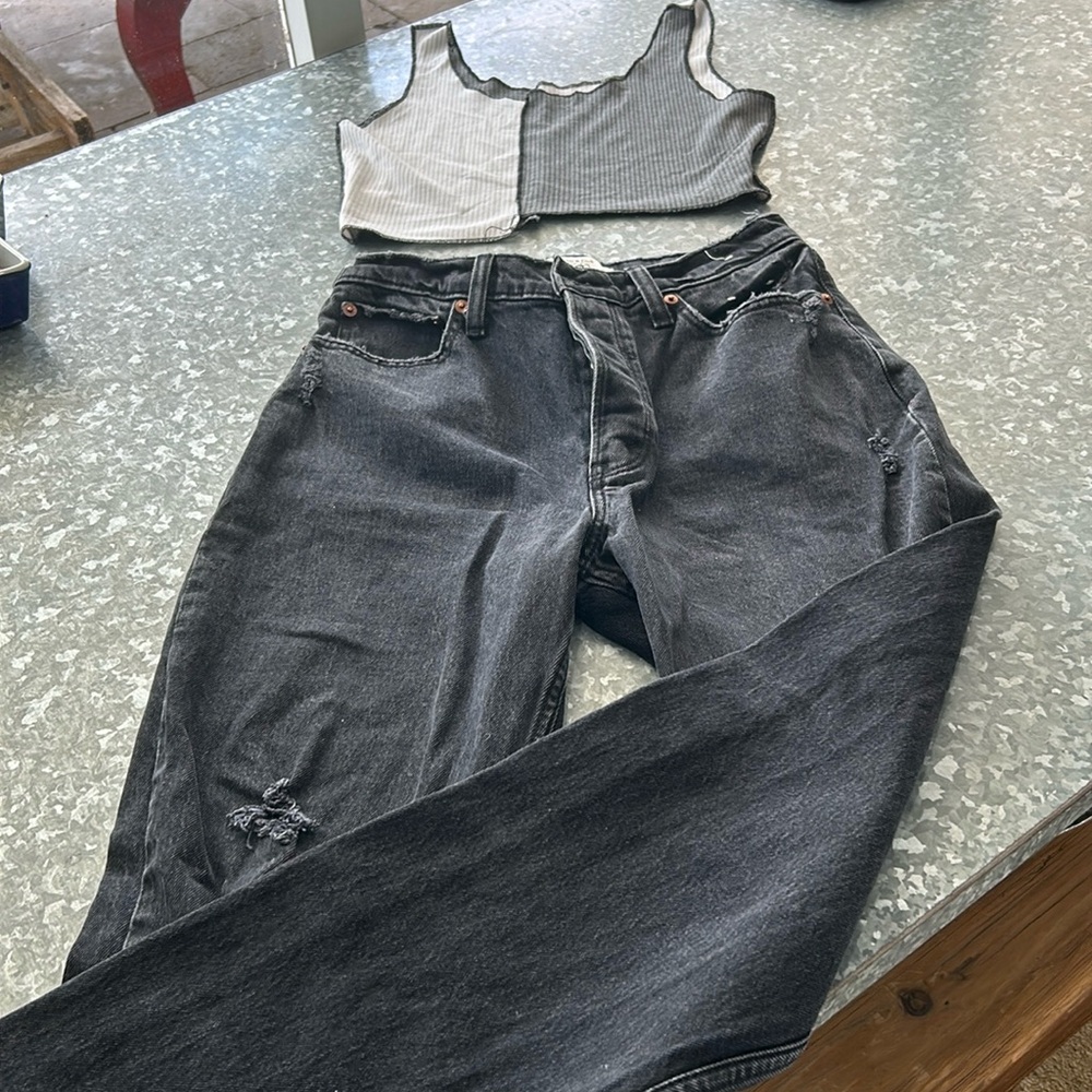 Outfit: gray and white top with black distressed jeans